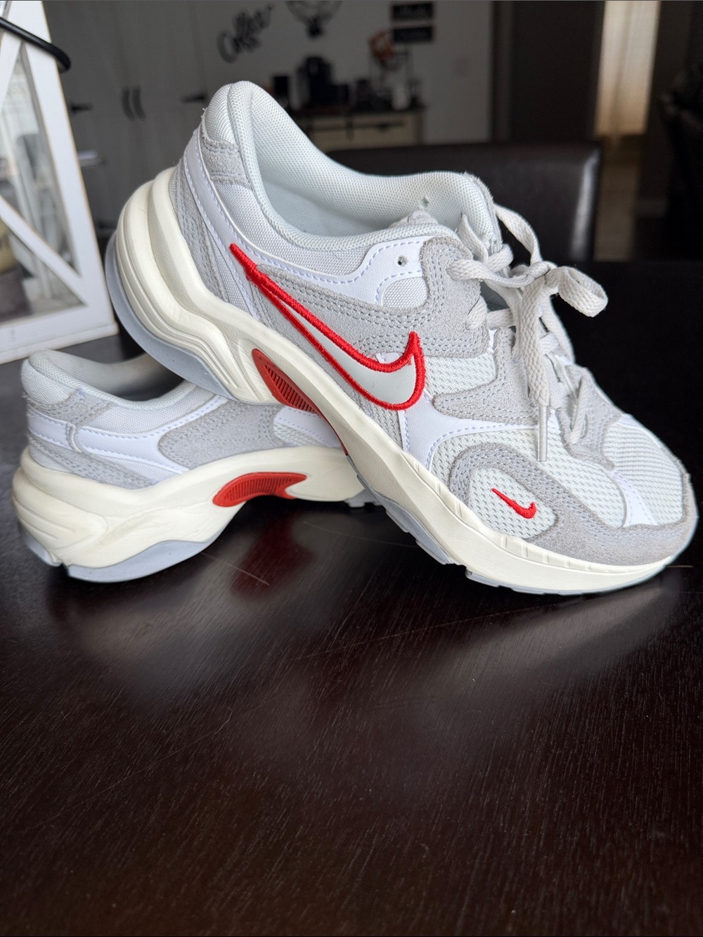 Nike womens Light Gray Mesh & Suede Sneakers with orange Swoosh
